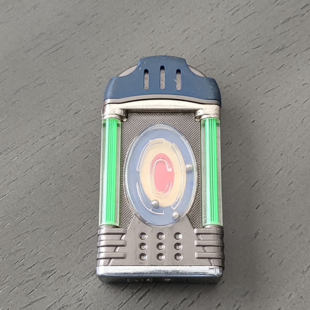 Innovative Gray and Green Gadget